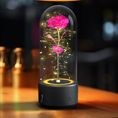 A unique gift that combines an LED light and a Bluetooth speaker with rose flowers.