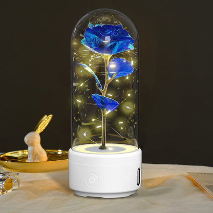 A unique gift that combines an LED light and a Bluetooth speaker with rose flowers.